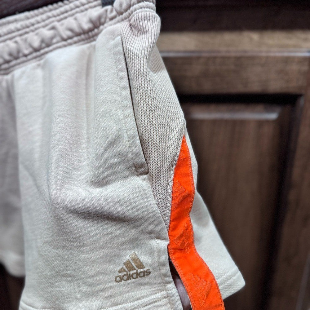 Adidas Badge of Sport Beige Lounge Shorts with Orange Trim - Size Small