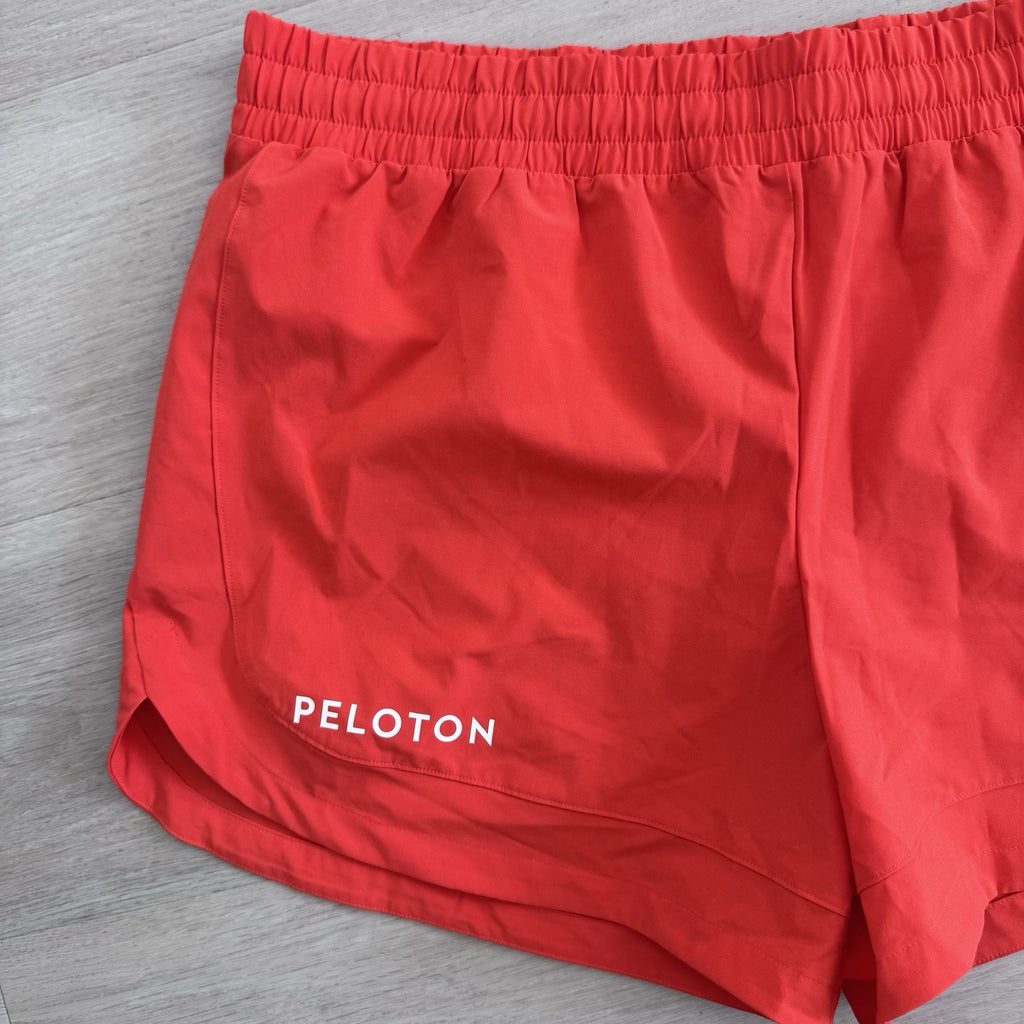 Peloton 4” Velocity Shorts Orange L NWT Lined Athletic Running Gym