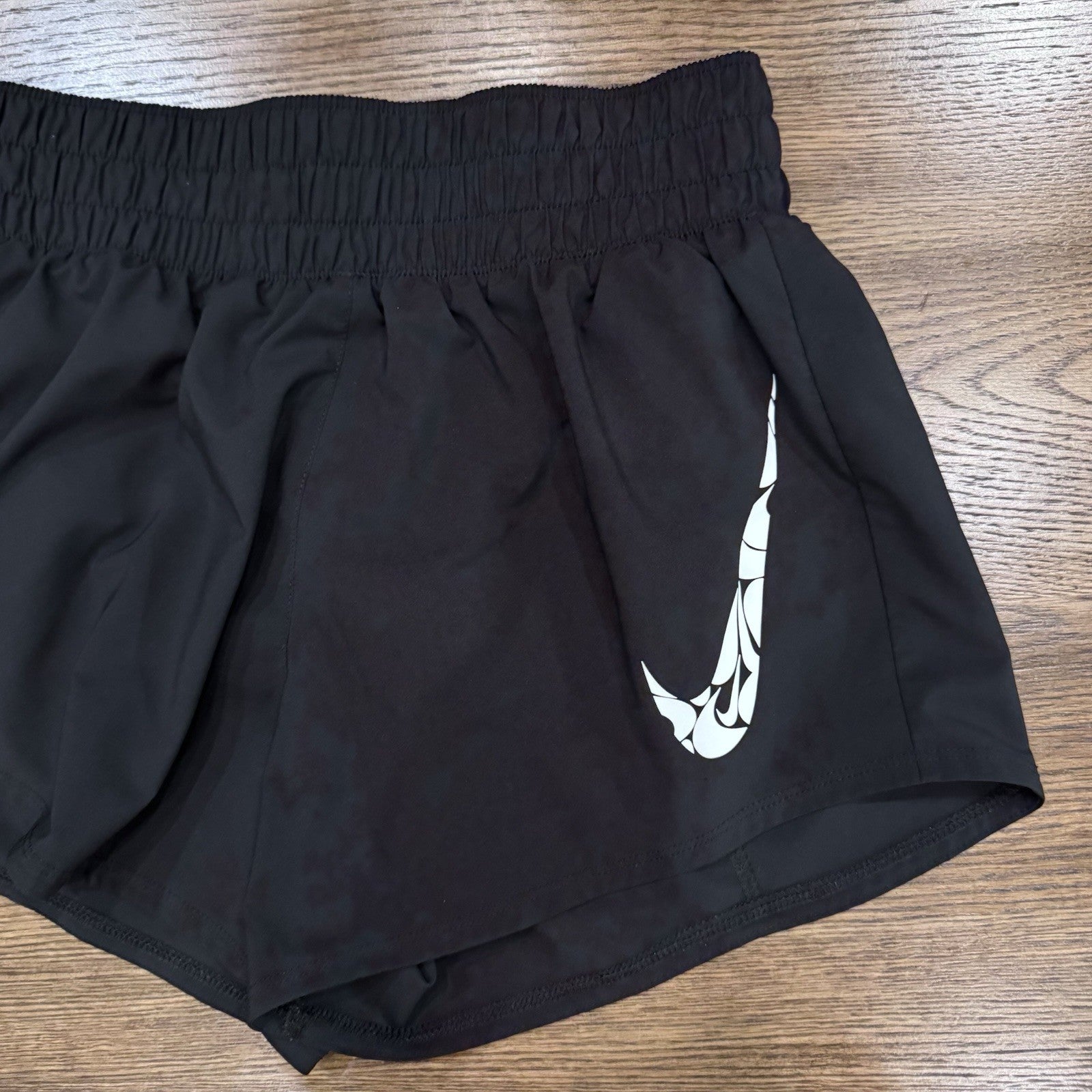 Nike Dri-Fit Running Shorts Women’s XS Black Graphic Swoosh Logo High Rise
