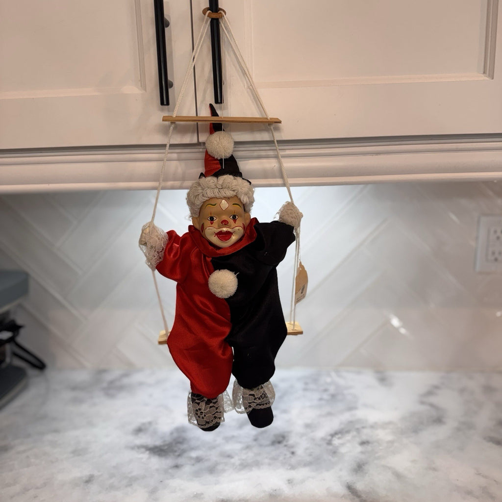 Vintage BVI Inc Porcelain Face Clown on Wooden Swing Red Black Harlequin Jester