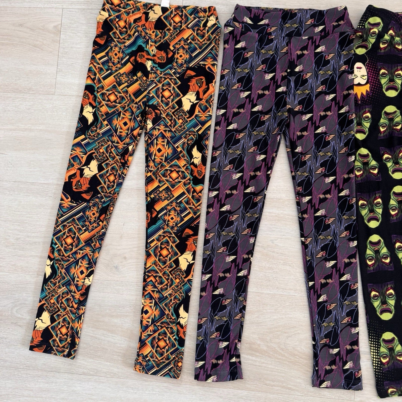 LuLaRoe Disney Villains Leggings Lot 4 L/XL Cruella Scar Evil Queen Maleficent