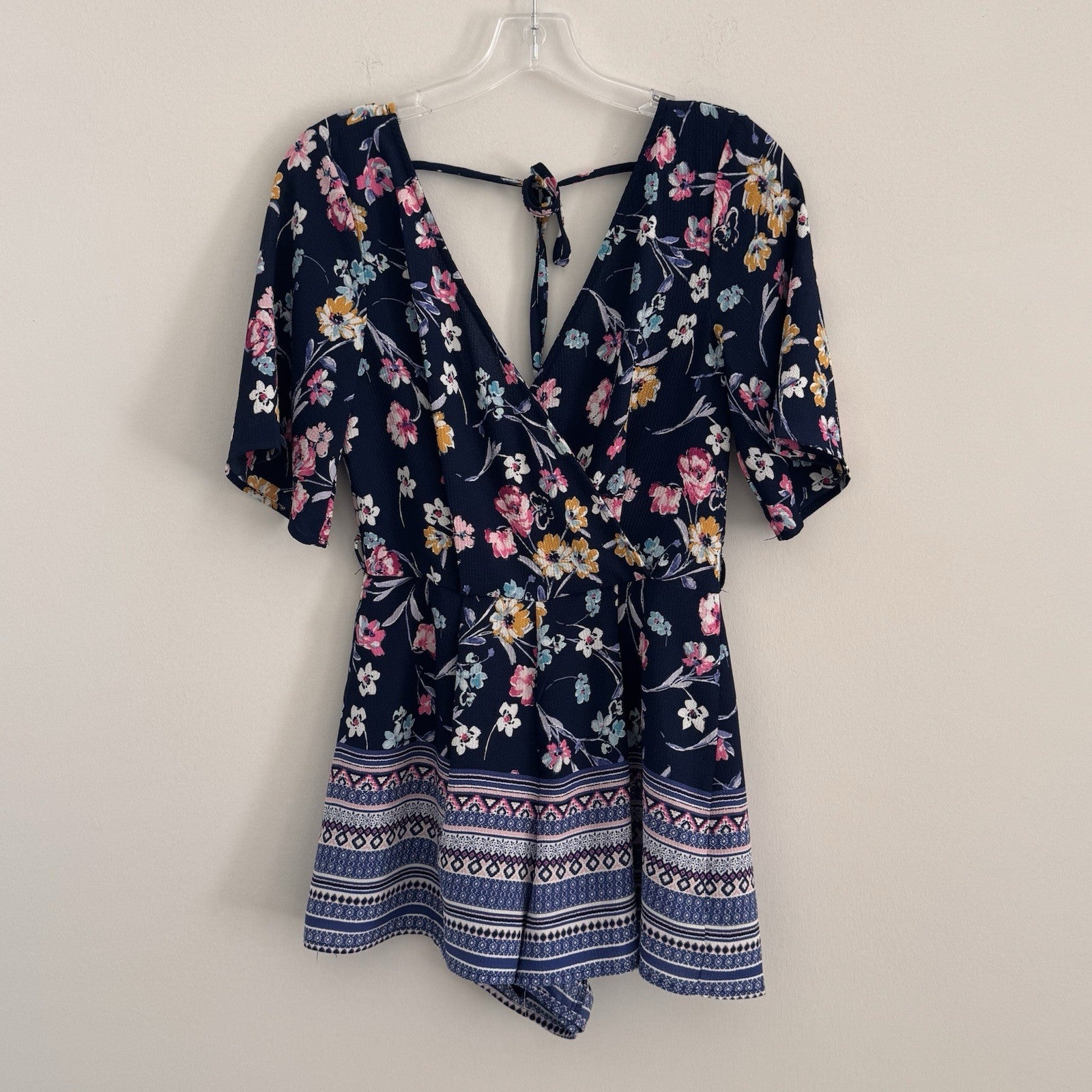 Francesca Blue Rain Floral Romper Women's Size XS Navy Blue V-Neck Boho Tie