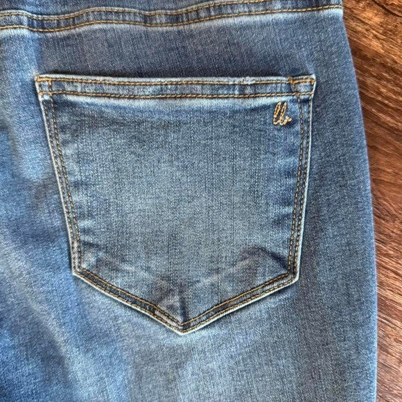 Size 26 Lularoe high rise skinny jeans with distressed knee details