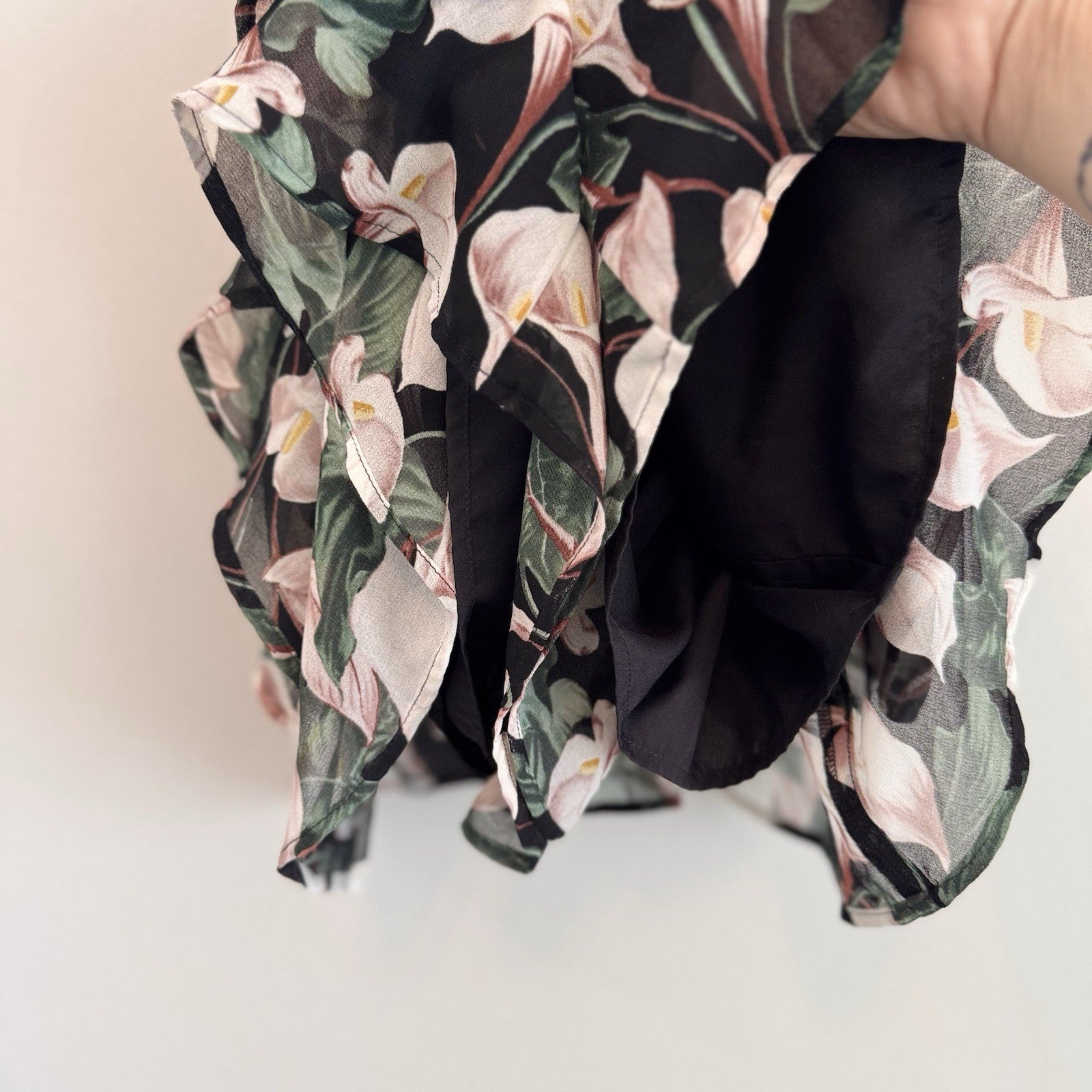 Express Black Floral Romper XS Calla Lily Print Ruffle Hem Strappy Back