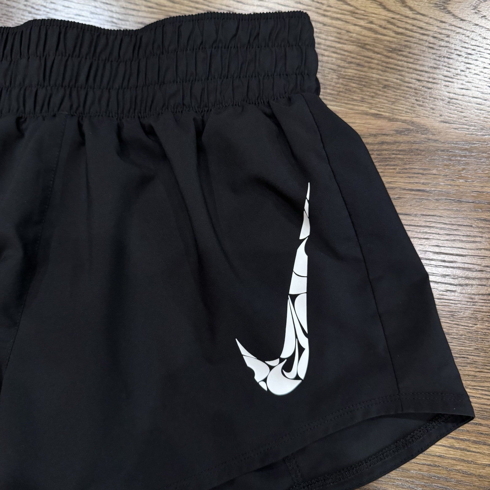 Nike Dri-Fit Running Shorts Women’s XS Black Graphic Swoosh Logo High Rise