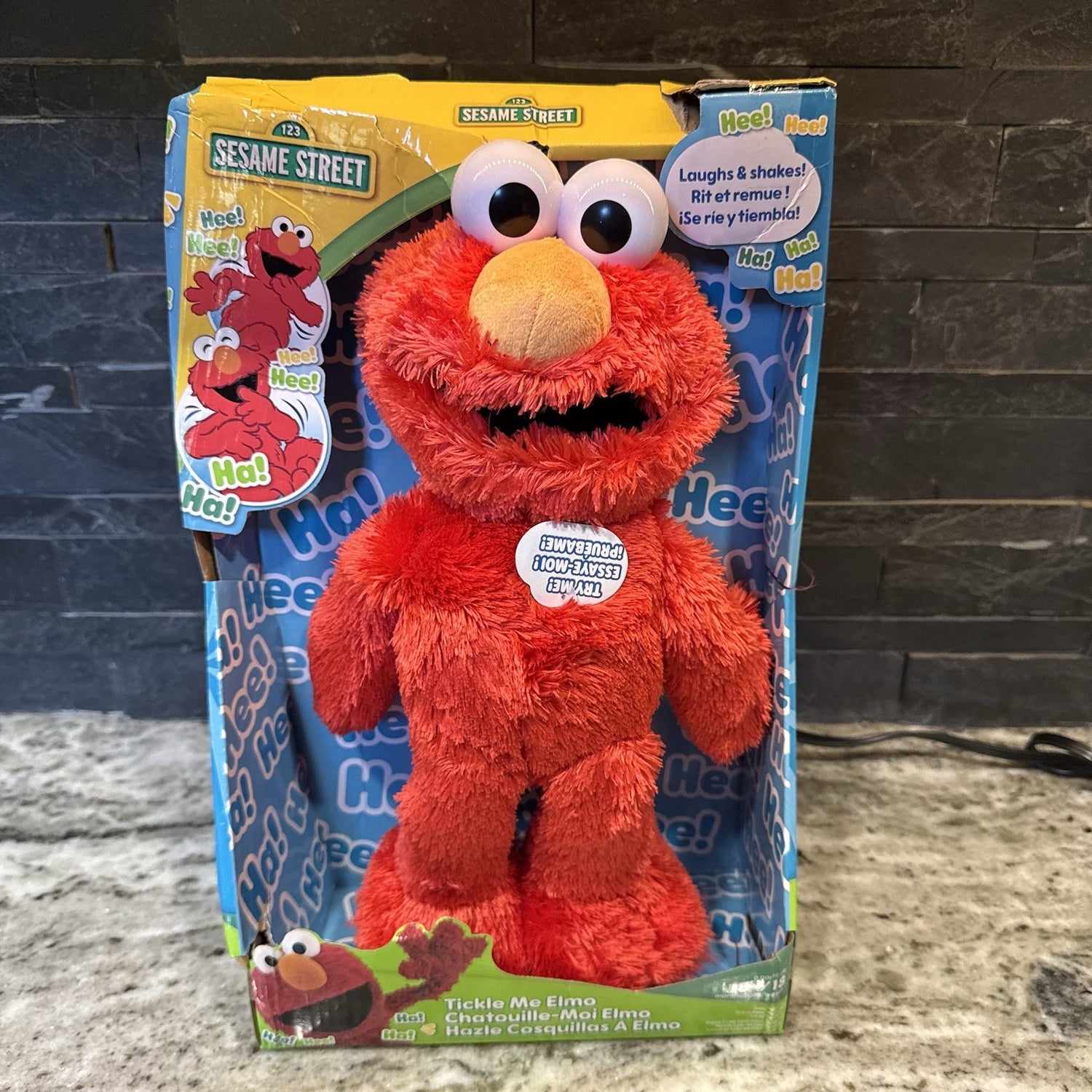 Sesame Street Tickle Me Elmo 13.5-inch Plush Doll, Laughs, Wiggles, and Giggles