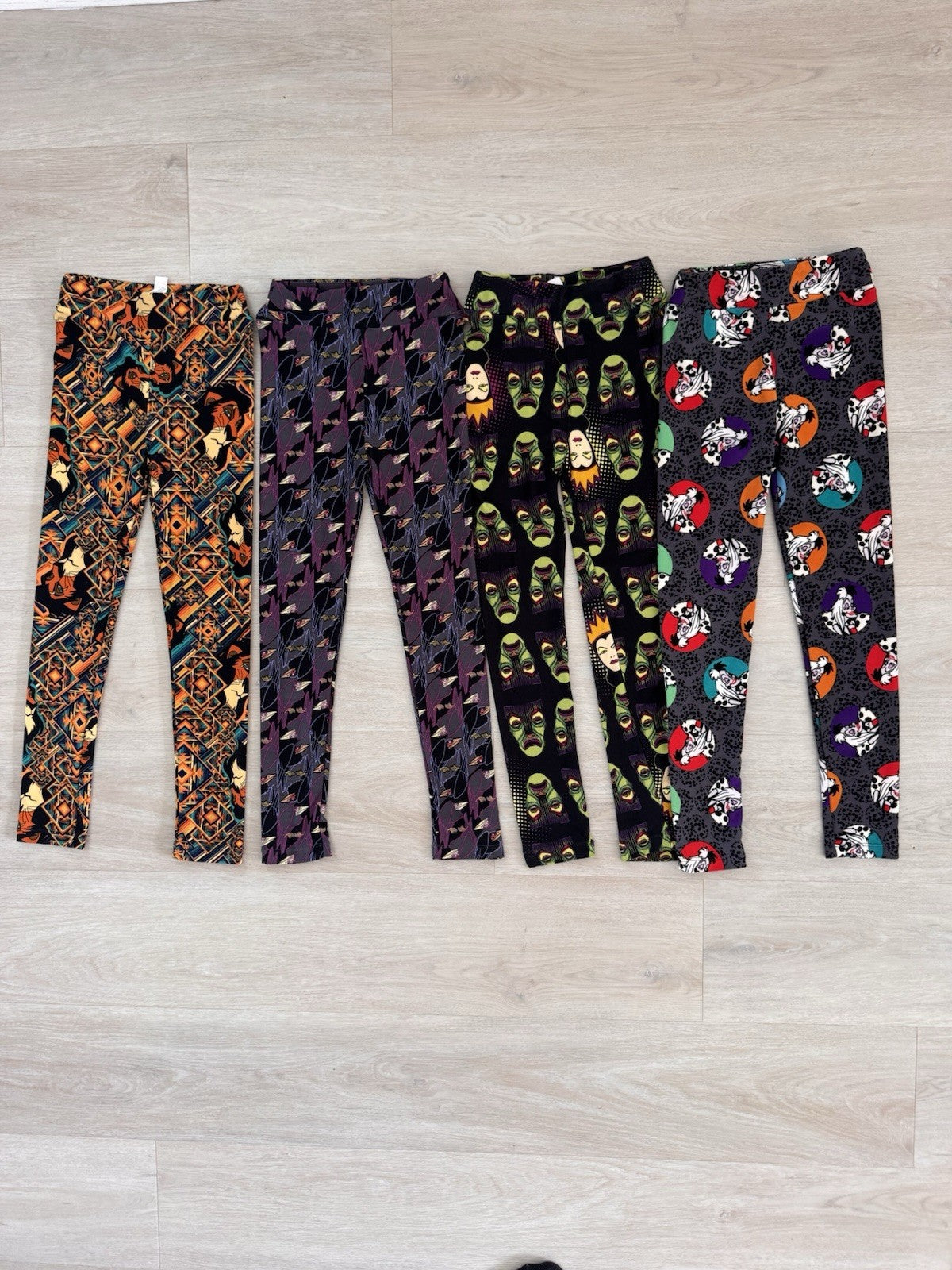 LuLaRoe Disney Villains Leggings Lot 4 L/XL Cruella Scar Evil Queen Maleficent