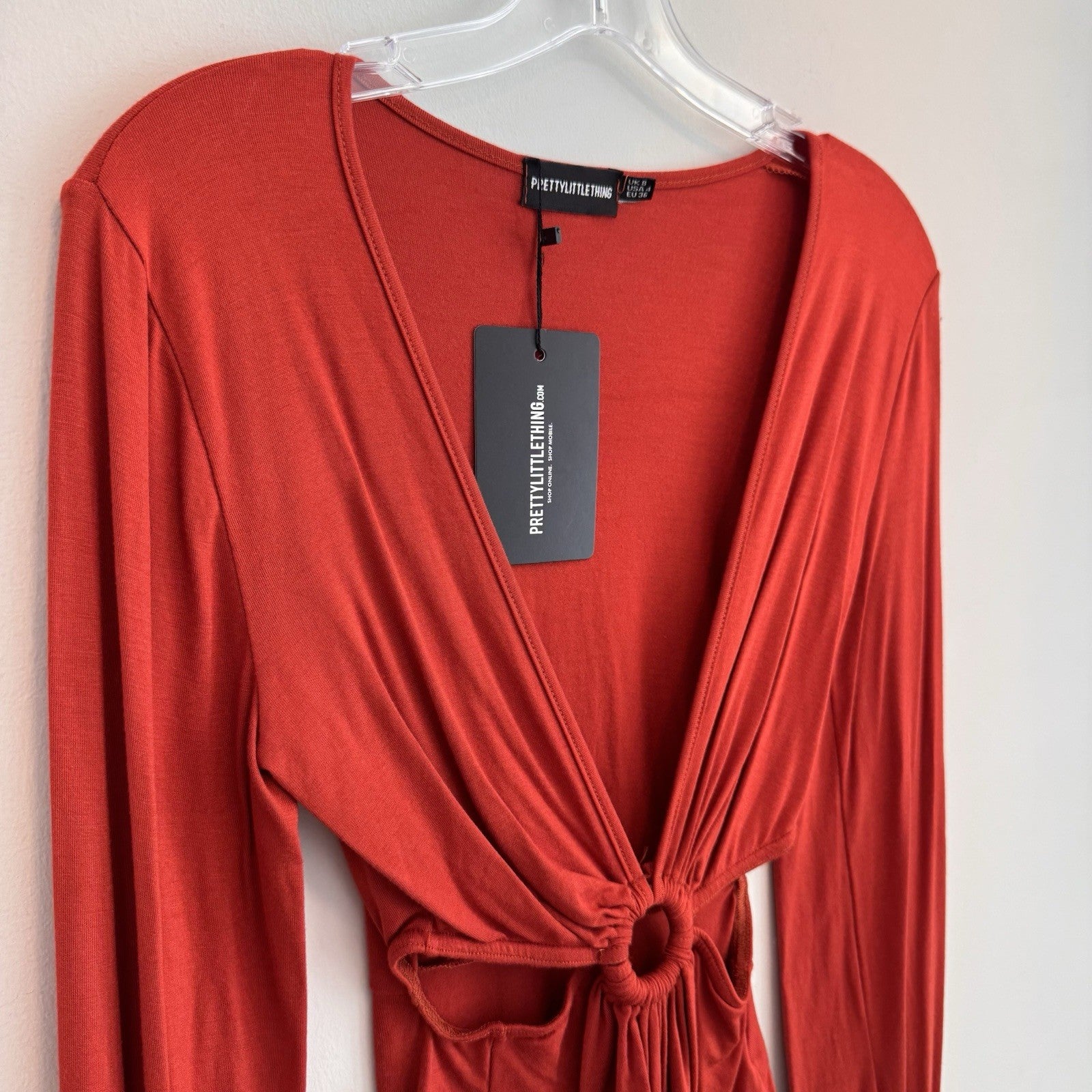 PrettyLittleThing Burnt Orange O-Ring Bodysuit Flare Sleeve Cutout Size 4 NWT 