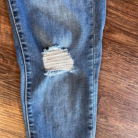 Size 26 Lularoe high rise skinny jeans with distressed knee details