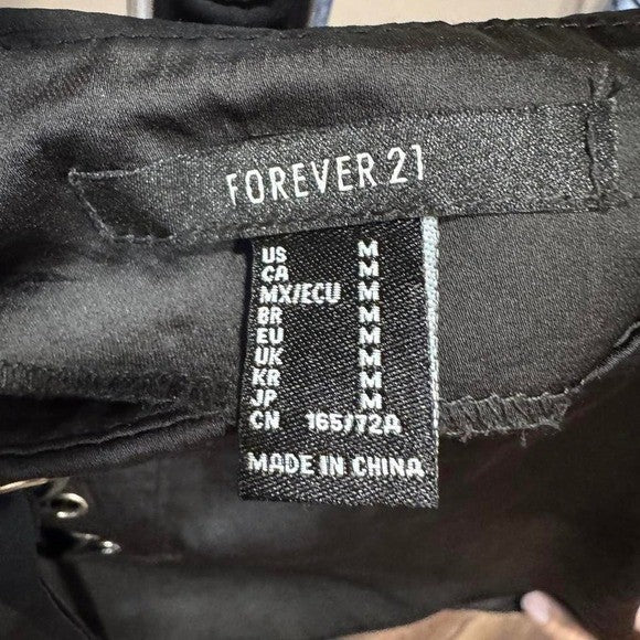 Forever 21 Black faux leather mini skirt with lace up detail #goth #rave