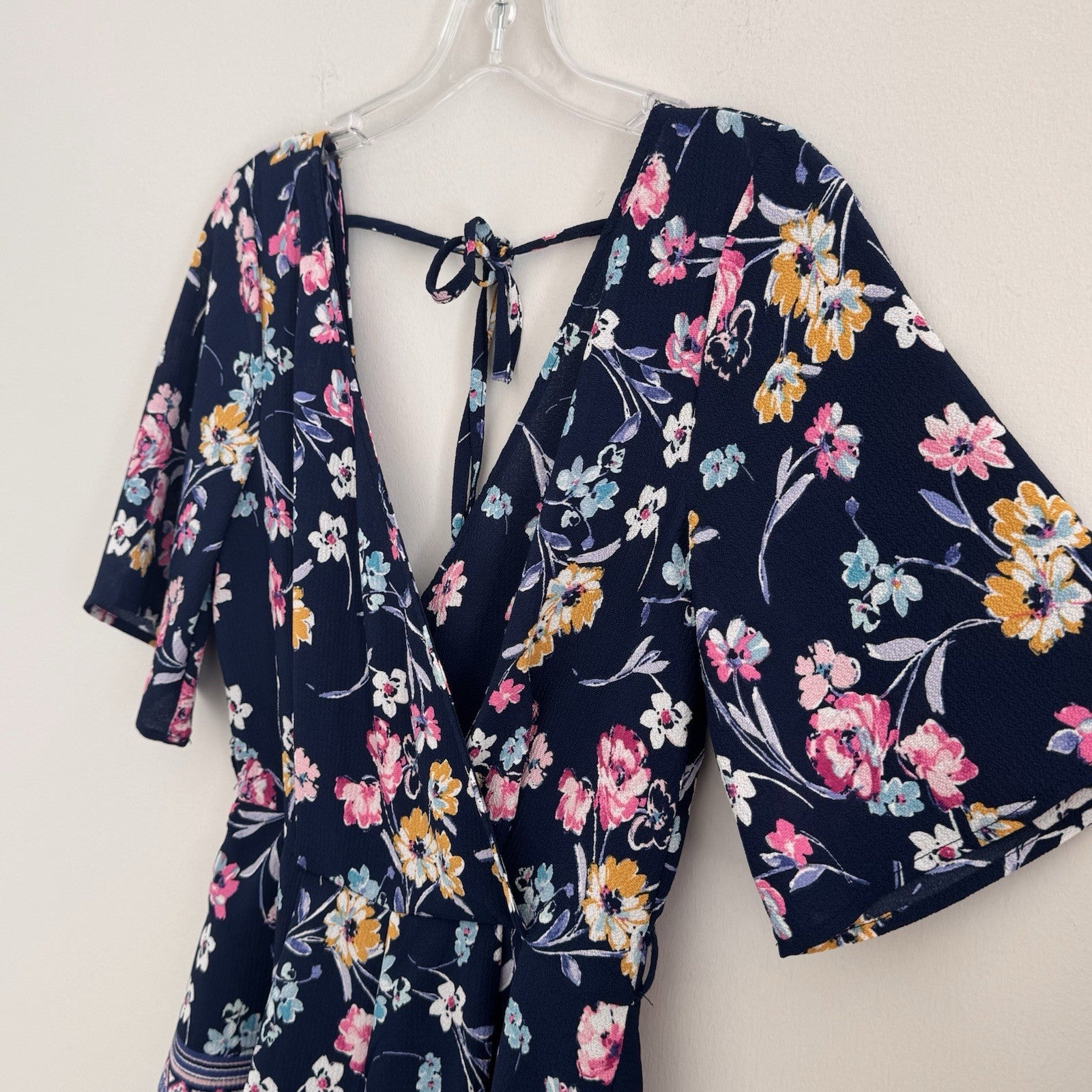 Francesca Blue Rain Floral Romper Women's Size XS Navy Blue V-Neck Boho Tie
