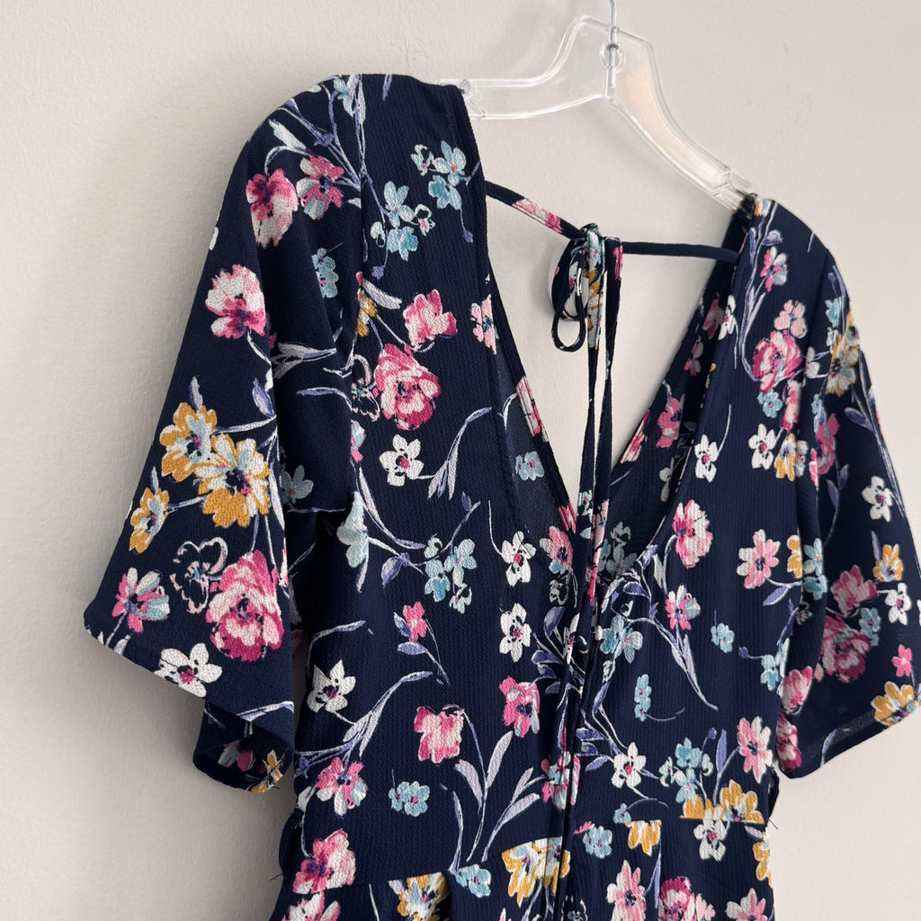 Francesca Blue Rain Floral Romper Women's Size XS Navy Blue V-Neck Boho Tie