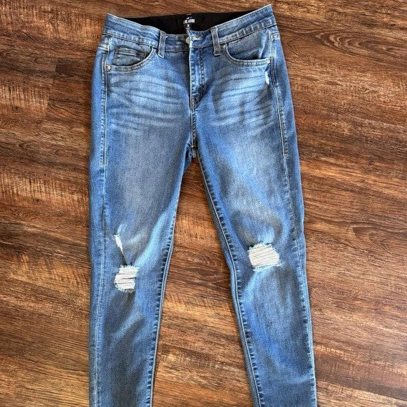 Size 26 Lularoe high rise skinny jeans with distressed knee details